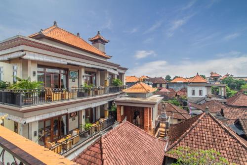an overhead view of a city with roofs at Umah Anila in Ubud
