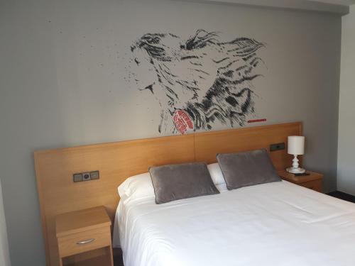 Postel nebo postele na pokoji v ubytování Hotel Arts - Gasteiz Centro