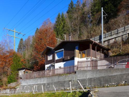 a house on the side of a hill at Holiday Home Chalet Guldeli by Interhome in Kandergrund
