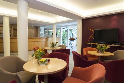 TV a/nebo společenská místnost v ubytování Hotel Gloria Superior