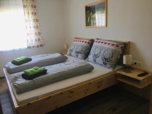 Giường trong phòng chung tại Urlaub am Moarbauerhof