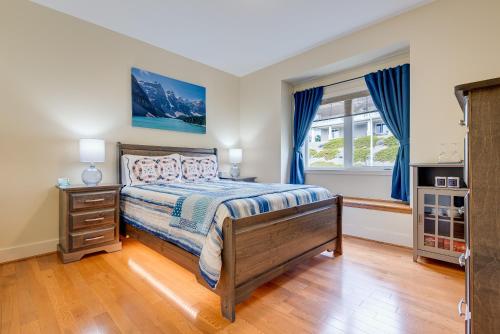 a bedroom with a bed and a window at Adela's Bed and Breakfast in West Kelowna