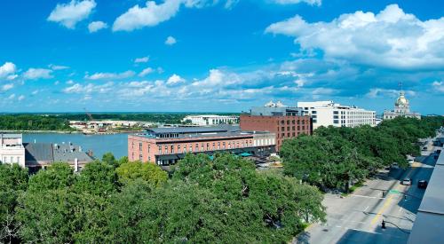a view of a city with a river and buildings at Hotel Indigo Savannah Historic District by IHG in Savannah