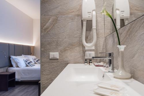 Koupelna v ubytování Hotel Alexander