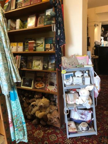 a book shelf filled with lots of stuffed animals at The Dog & Partridge Country Inn in Ashbourne