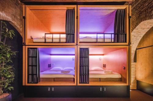 Кровать или кровати в номере Bunk Hotel Amsterdam