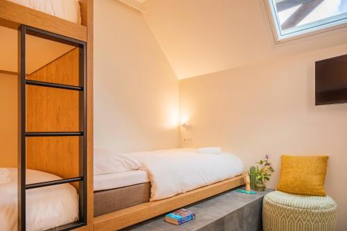 Кровать или кровати в номере Bunk Hotel Amsterdam
