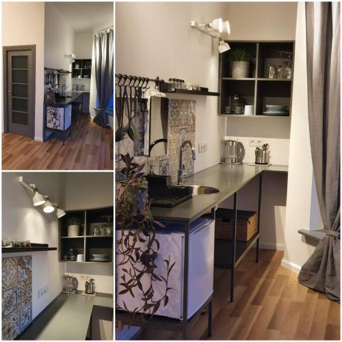 a kitchen with a sink and a counter top at Valet Apartment in Mārupe