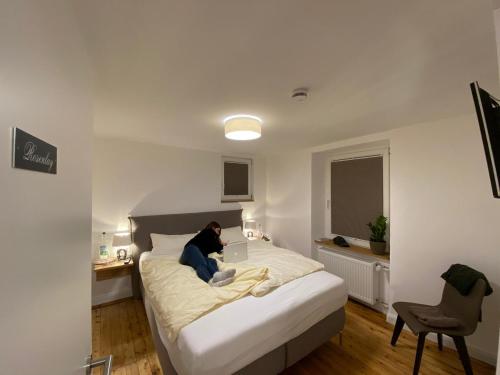 Ένα ή περισσότερα κρεβάτια σε δωμάτιο στο Schlössje