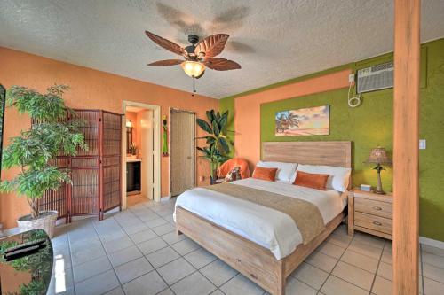a bedroom with a bed and a ceiling fan at Relaxing Waterfront 2-Story Retreat with Pool Access in Naples