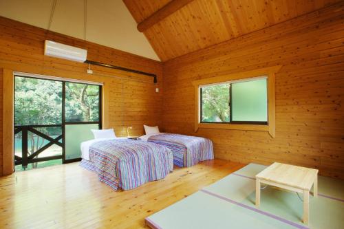 Llit o llits en una habitació de Lodge Kiyokawa