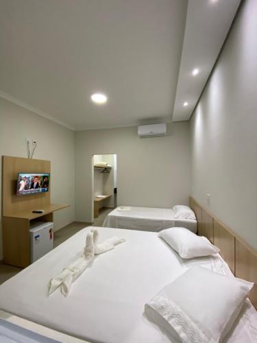 Katil atau katil-katil dalam bilik di NOROESTE Comfort Hotel