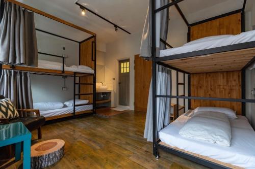 Postel nebo postele na pokoji v ubytování Cozy House Hostel