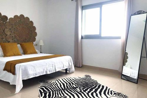 Кровать или кровати в номере Villa d’Aina * Propiedad privada con piscina