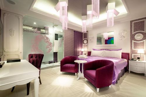 Katil atau katil-katil dalam bilik di AURORA MOTEL
