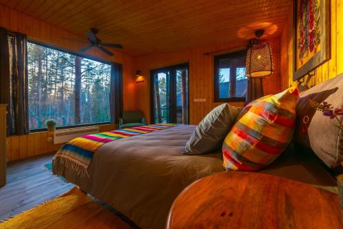 Ένα ή περισσότερα κρεβάτια σε δωμάτιο στο Sambliku Treehouse