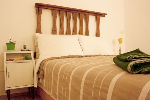Ein Bett oder Betten in einem Zimmer der Unterkunft Ritornello B&B