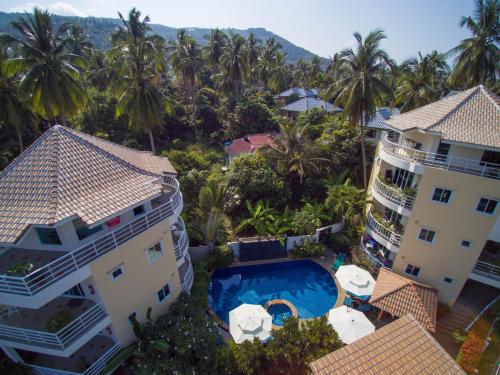 an aerial view of a building and a swimming pool at Chaweng Noi Residence in Chaweng Noi Beach