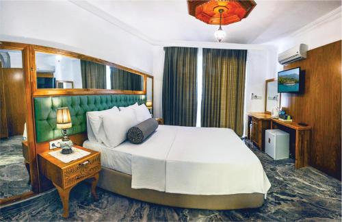 Cama o camas de una habitación en Gumus Konak