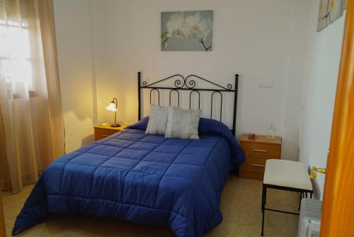 Postel nebo postele na pokoji v ubytování CASA RURAL SIERRAS DE GAUCIN
