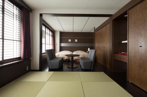 Χώρος καθιστικού στο Kitahiroshima Classe Hotel