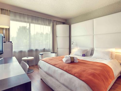 Postel nebo postele na pokoji v ubytování Mercure Brive