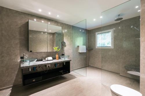Ett badrum på Marina Sands Resort