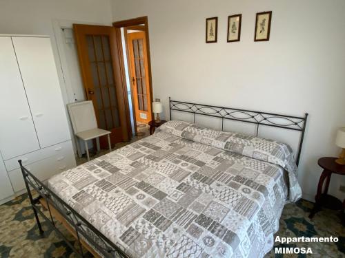 Giường trong phòng chung tại I Fiori di Pietra