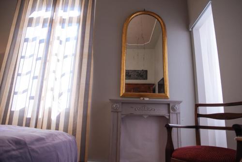Katil atau katil-katil dalam bilik di Ai tre cedri B&B