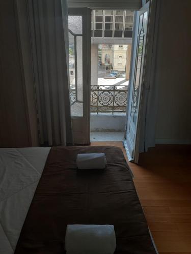 Ένα ή περισσότερα κρεβάτια σε δωμάτιο στο Hotel Praça da Matriz