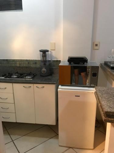 Una cocina o zona de cocina en Differential Flat por temporada próximo Hospital Biocor Vila da Serra