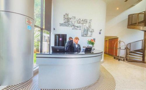 TV/Unterhaltungsangebot in der Unterkunft Jardim Paulista Apartamento com Vista