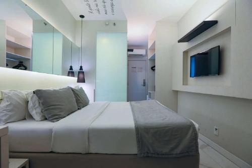 Televisyen dan/atau pusat hiburan di Nobile Hotel Copacabana Design