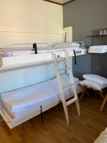 a couple of bunk beds in a room at Strand City Hotel in Örnsköldsvik
