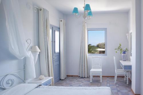 Postel nebo postele na pokoji v ubytování Atlantis Beach Villa