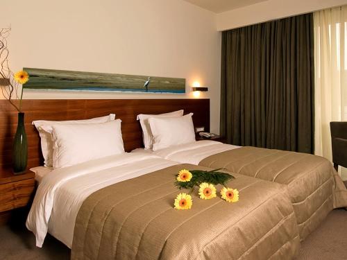 Postel nebo postele na pokoji v ubytování Lucy Hotel