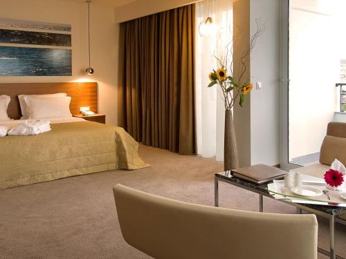Postel nebo postele na pokoji v ubytování Lucy Hotel