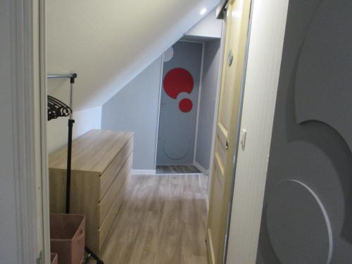 a hallway with a stairway with a room with a stair at La Ferme de la Chapelle-Saint-Jean in Beynat