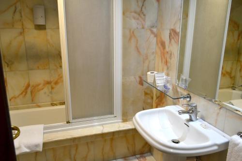 Ένα μπάνιο στο Hotel Alda El Suizo