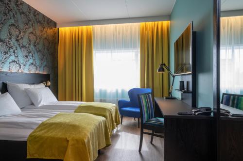 En eller flere senger på et rom på Thon Hotel Oslo Airport