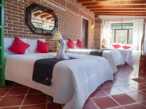 Cama o camas de una habitación en Valle Dorado