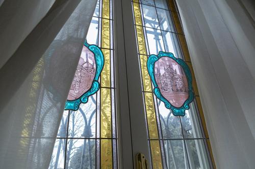 a stained glass window in a room at Hotel Donatello in Florence