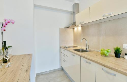 Kuchyňa alebo kuchynka v ubytovaní Apart Residence Rudan
