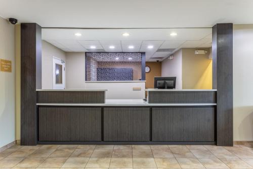 a lobby of a hospital with a reception desk at Candlewood Suites Aurora-Naperville by IHG in Aurora
