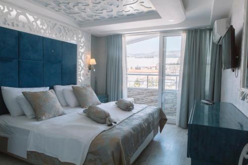 Postel nebo postele na pokoji v ubytování Pamukkale Melrose Viewpoint Suites