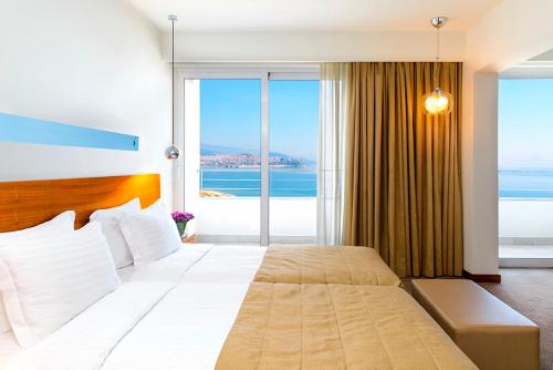 Postel nebo postele na pokoji v ubytování Lucy Hotel