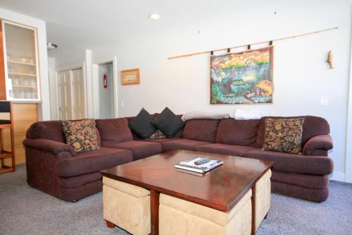 a living room with a couch and a coffee table at Mountainback 062 in Mammoth Lakes