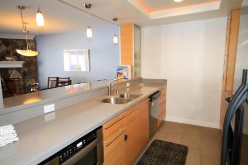 a kitchen with a sink and a counter at Mountainback 062 in Mammoth Lakes