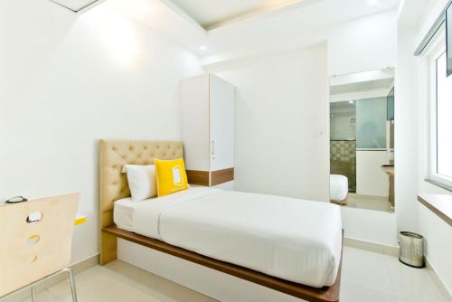Ένα ή περισσότερα κρεβάτια σε δωμάτιο στο X by Bloom l Manyata