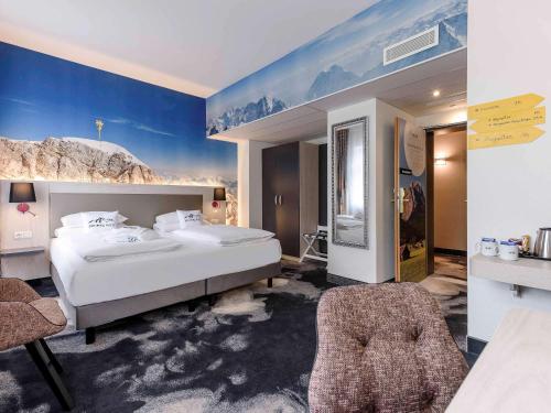 Tempat tidur dalam kamar di Mercure München am Olympiapark